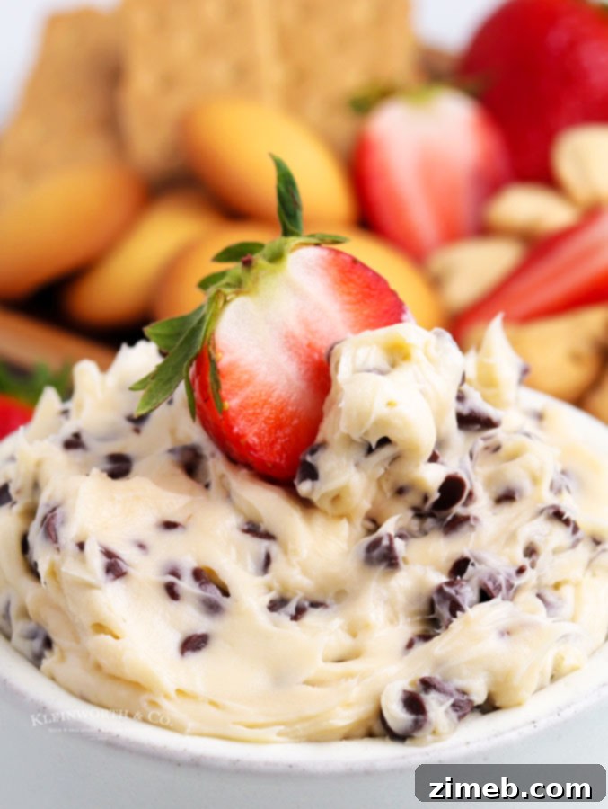 A delightful chocolate chip Cookie Dough Dip, a quick and easy dessert recipe. This no-bake dip is perfect for serving at parties with an assortment of dippers like cookies, fresh fruit, or pretzels. Its rich, sweet, and creamy texture makes it a favorite.