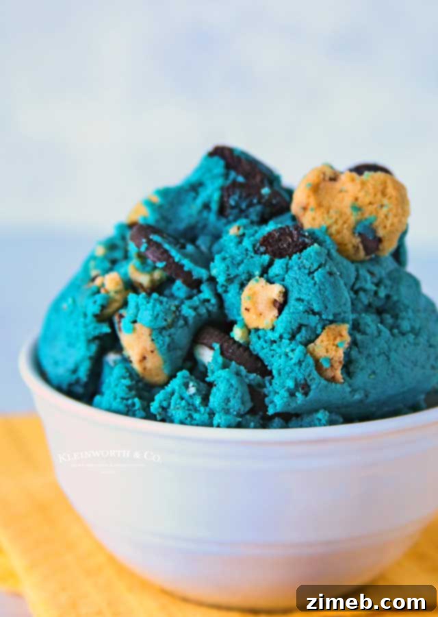 Egg-free blue cookie dough with mini cookies, ready to eat.