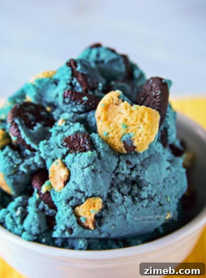 Close-up of edible cookie dough monster, showing texture and cookie bits.