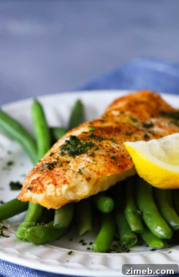 Air fried cod fillets, golden and perfectly cooked for a healthy meal.