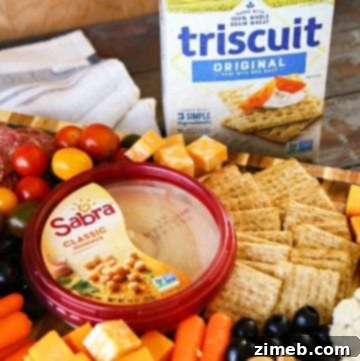 Triscuit and Sabra on snack board