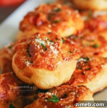 Tropical Pineapple Salsa 14 Delicious Cheesy Pepperoni Pizza Pinwheels on a platter