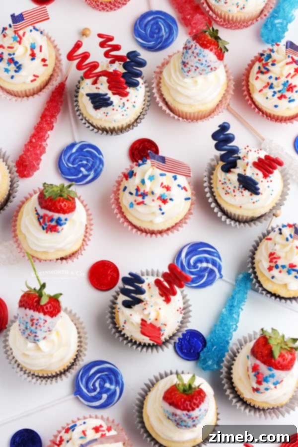 Beautifully decorated patriotic cupcakes featuring candy melt decorations and sprinkles.