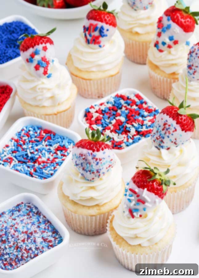 Delicious patriotic chocolate covered strawberries, adorned with red, white, and blue sprinkles, perfect for 4th of July desserts.