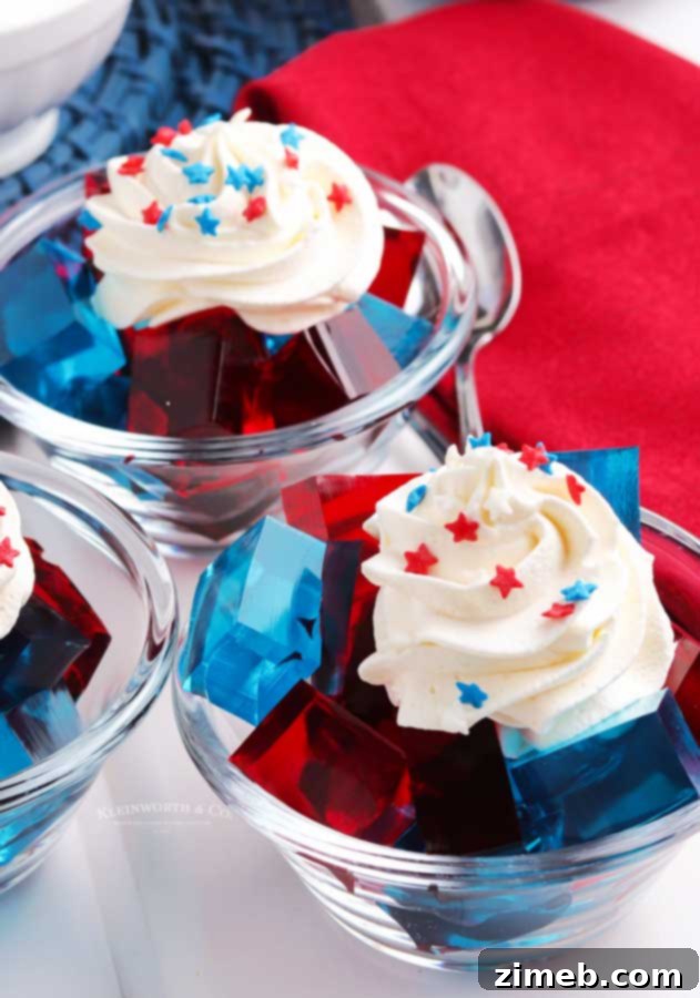 Jello Jigglers with whipped cream and sprinkles