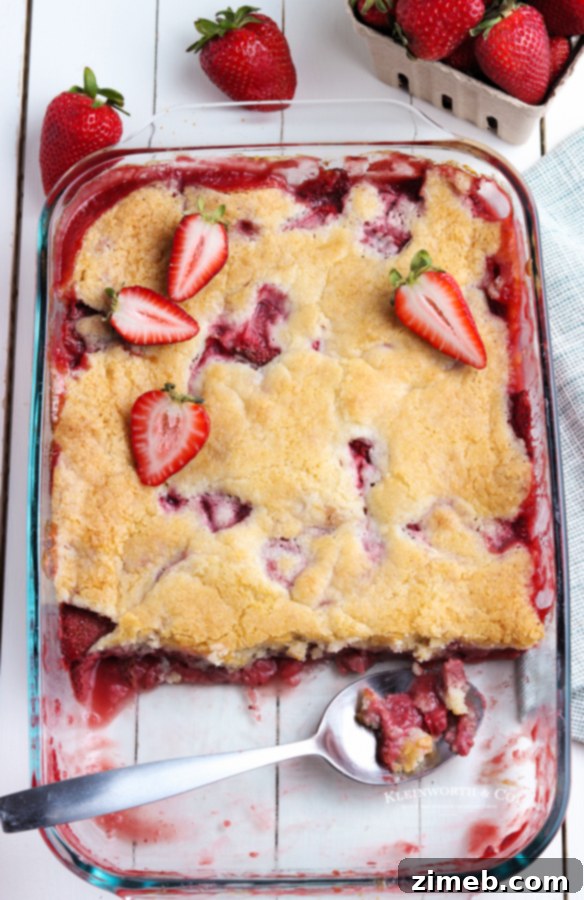 Fresh strawberry cobbler, a sweet and simple summer dessert.