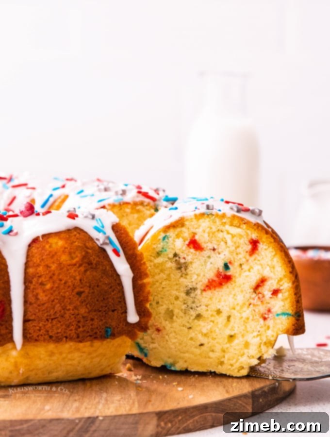 A beautiful, freshly baked 4th of July Bundt Cake cooling on a wire rack, ready for glazing and serving.
