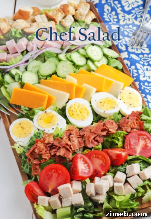 Effortless Chef Salad 17 Easy Chef Salad presented in a light blue bowl, fresh and ready.
