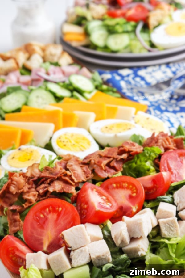 Effortless Chef Salad 3 Homemade Chef Salad ingredients beautifully arranged in a large bowl.