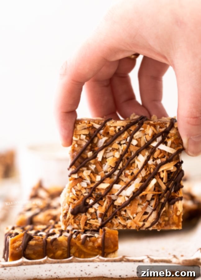 Classic Samoa Cookie Bars 3 Homemade Samoa Bars - Caramel, coconut, and chocolate dessert