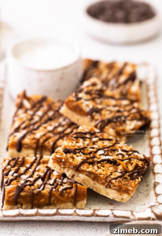 Classic Samoa Cookie Bars 4 Samoa Squares - Homemade version of classic Girl Scout cookies