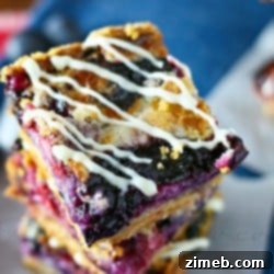 Ruby Red Cherry Squares 15 Red White & Blueberry Pie Bars from www.kleinworthco.com, loaded with berries for patriotic events.