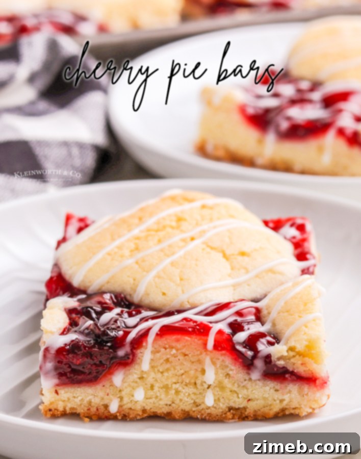 Ruby Red Cherry Squares 20 Cherry Pie Bars or Kuchen Bars, a close-up of the delicious layers with crumble and glaze.