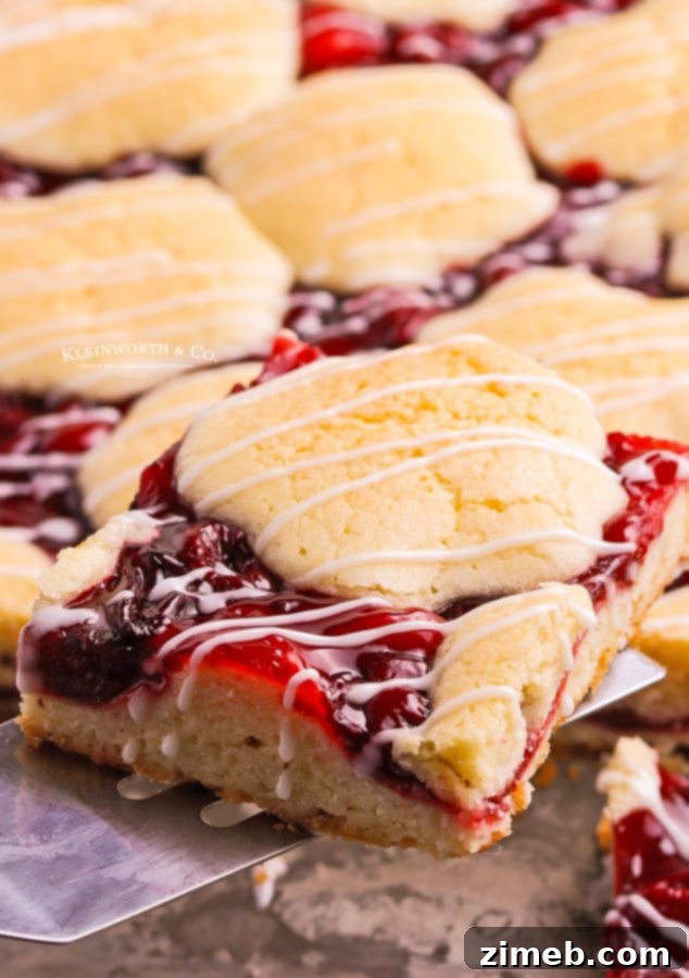 Ruby Red Cherry Squares 6 Homemade cherry pie cookie bars with a sweet white glaze, perfectly baked and ready to enjoy.
