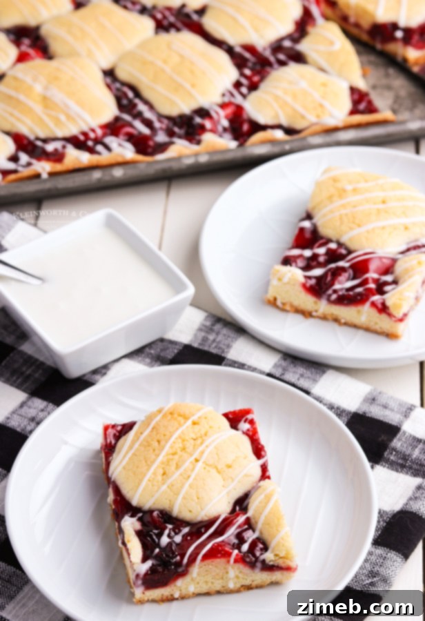 Ruby Red Cherry Squares 9 Freshly baked Kuchen Bars, a perfect summer fruit dessert with cherries and a delicate glaze.