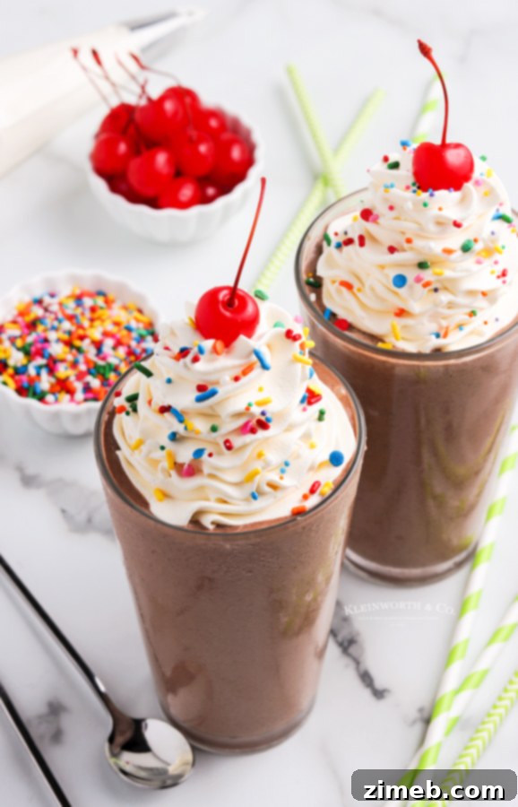 Heavenly Chocolate Milkshake 9 A deliciously loaded milkshake with colorful sprinkles, a visual treat for any dessert lover.