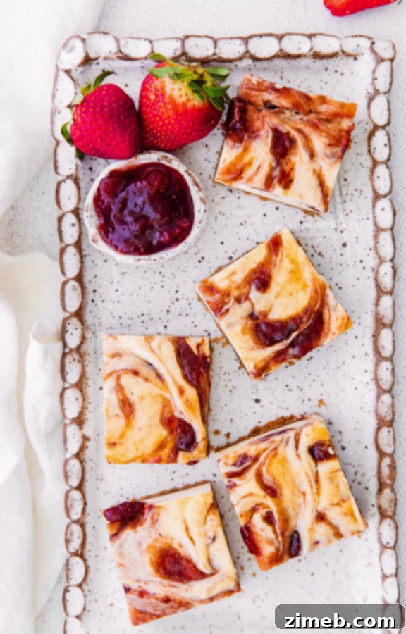 Luscious Strawberry Cheesecake Squares 5 Delicious strawberry cheesecake with a perfect crust
