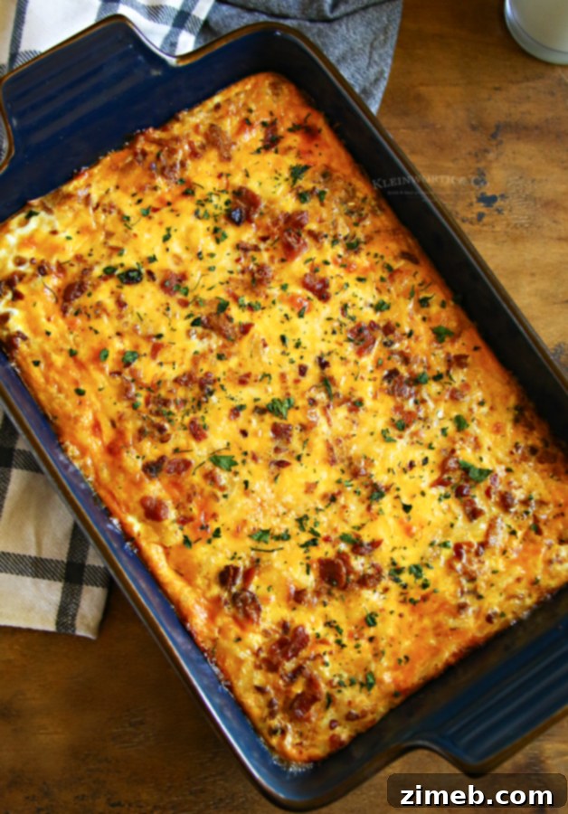 This super easy Hashbrown Breakfast Casserole is made with milk, eggs, butter, sausage, bacon, hash browns, and cheese. What a great start to the day!