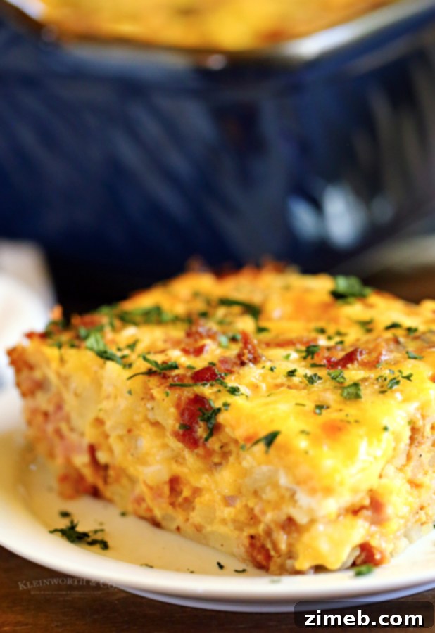 This super easy Hashbrown Breakfast Casserole is made with milk, eggs, butter, sausage, bacon, hash browns, and cheese. What a great start to the day!