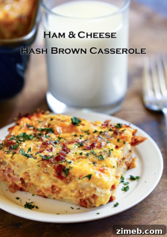 This super easy Hashbrown Breakfast Casserole is made with milk, eggs, butter, sausage, bacon, hash browns, and cheese. What a great start to the day!