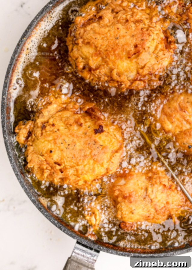 Cooking fried chicken in a pot