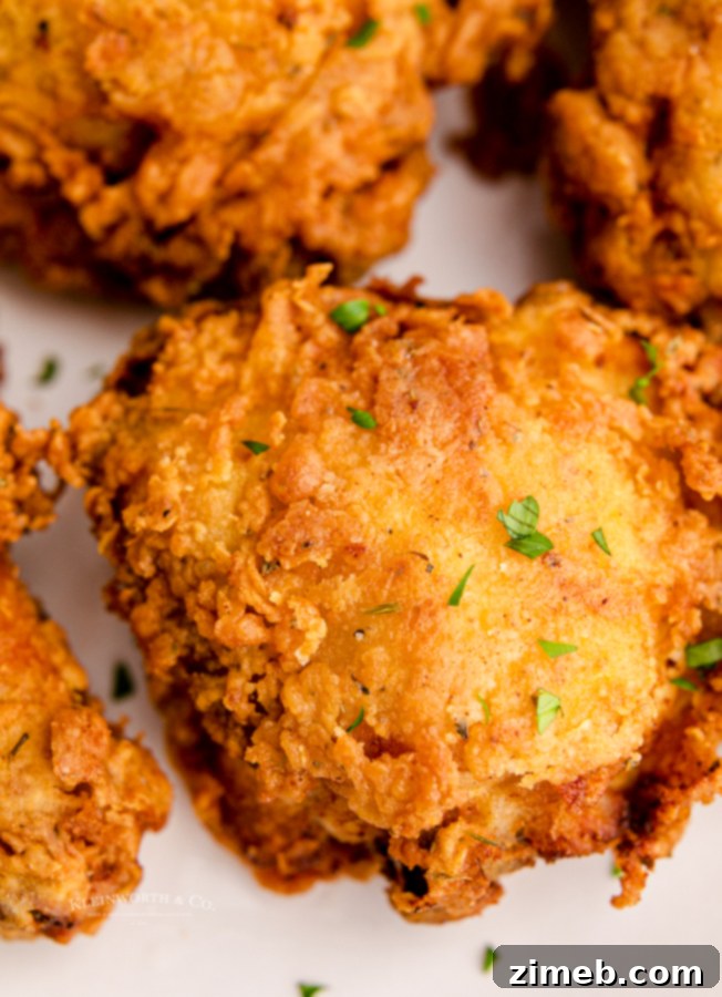Crispy fried chicken on a cutting board
