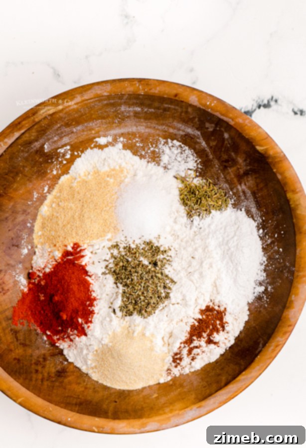 Spices for fried chicken in small bowls