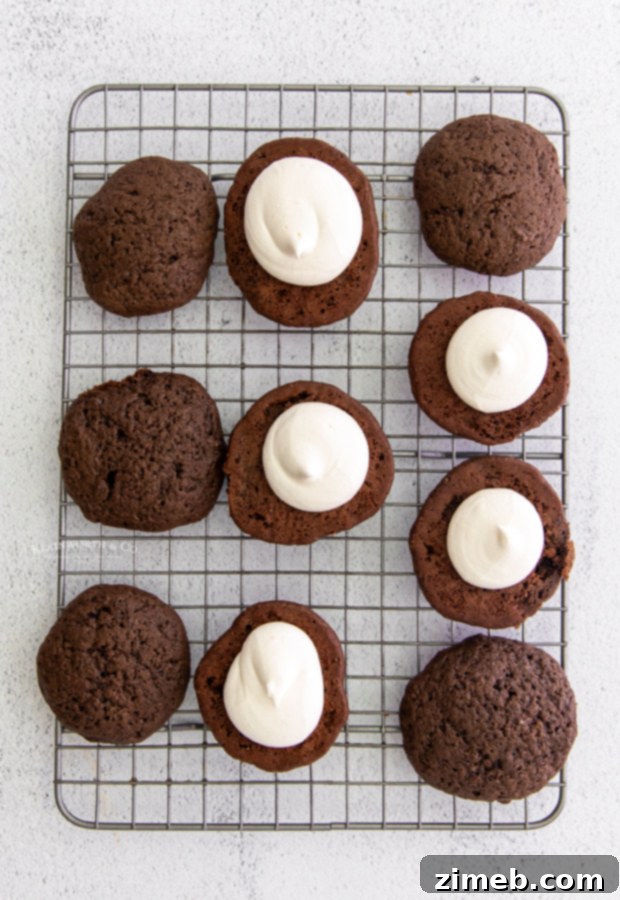 Decadent Whoopie Pie Delights 9 Assembling whoopie pies with creamy marshmallow filling