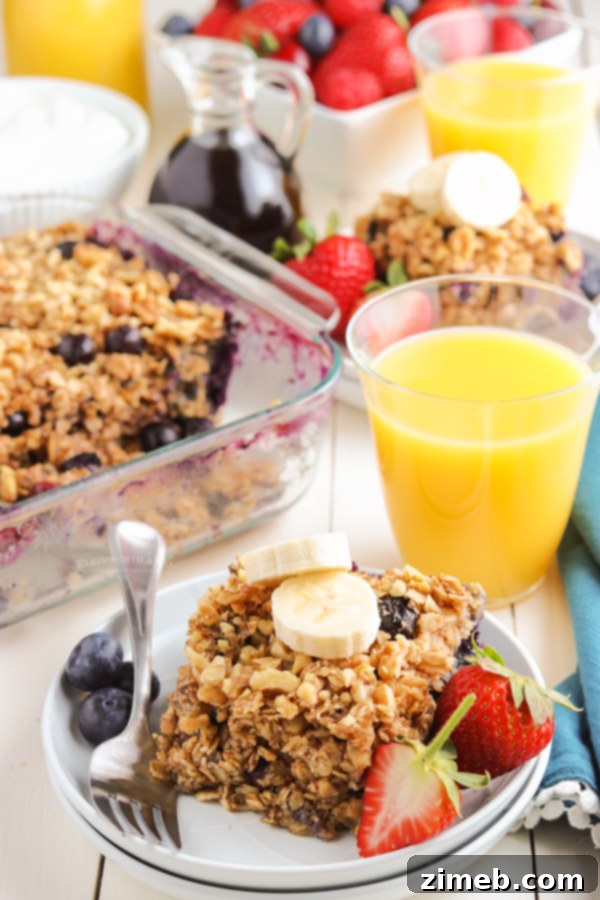 Warm Blueberry Oat Bake 18 A warm bowl of baked oatmeal, steaming gently, topped with a few fresh blueberries and a drizzle of honey, inviting a cozy breakfast experience.