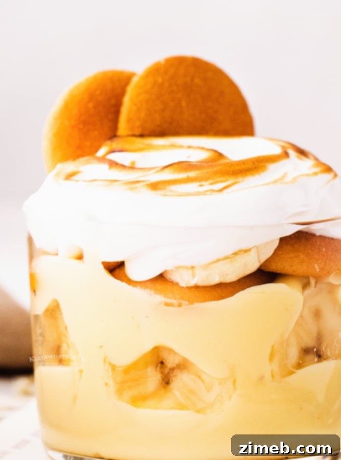 Layered Nilla wafers with creamy banana pudding and meringue