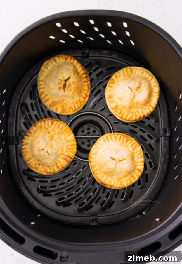 Golden Air Fryer Apple Pockets 7 cooked hand pies in the air fryer