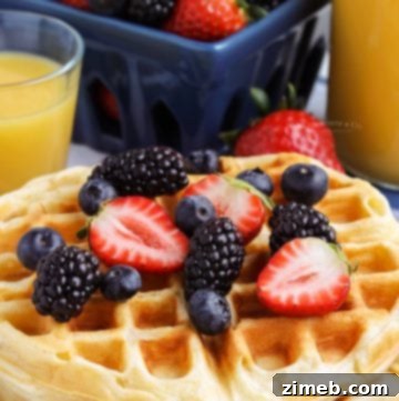 Morning food - waffle with berries, fluffy and golden