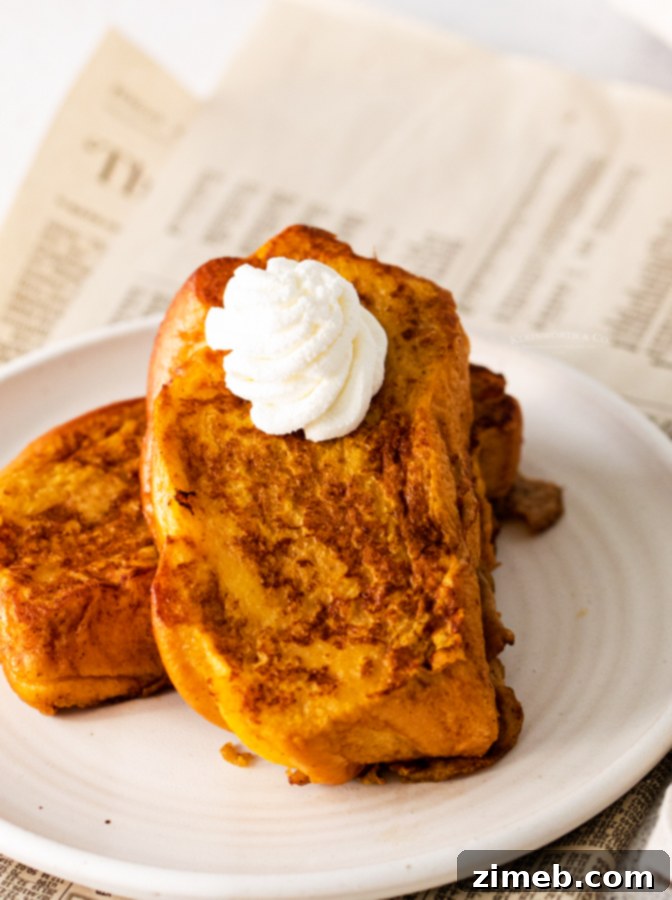 Close-up of golden brown fall french toast slices on a plate