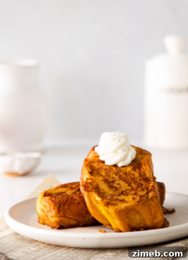 Delicious fall breakfast of Pumpkin French Toast drizzled with maple syrup