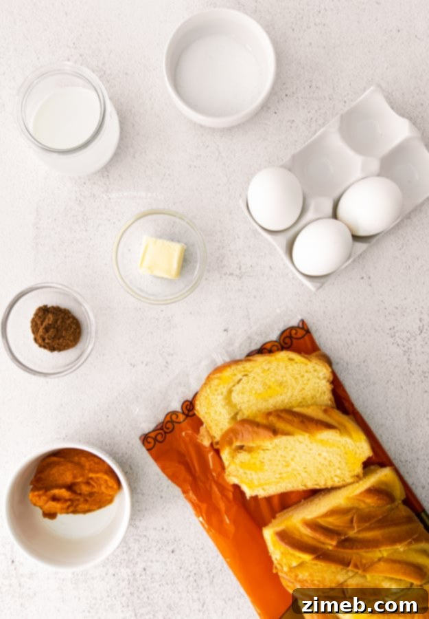 Ingredients for making Pumpkin French Toast including eggs, pumpkin puree, milk, and brioche