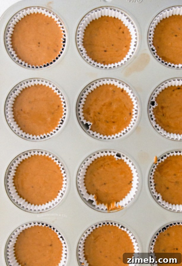 Pumpkin cupcakes baking in the pan