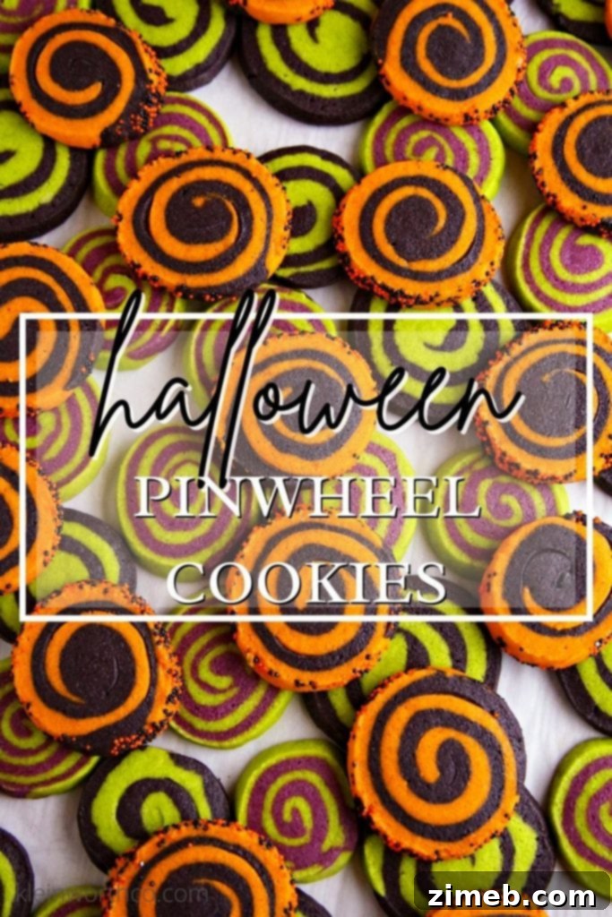 Wickedly Delicious Halloween Cookies 2 Halloween Sugar Cookies with vibrant green, orange, purple, and black swirls