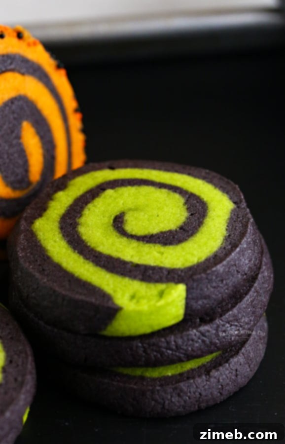 Wickedly Delicious Halloween Cookies 15 Close-up of black Halloween cookies with subtle swirls