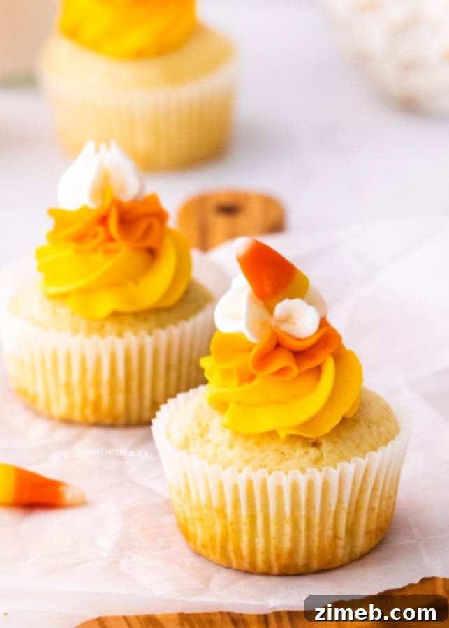 Harvest Harmony Cupcakes 4 Frosted fall cupcakes showcasing the candy corn color scheme.