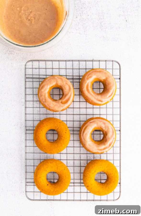 Maple Cream Cheese Frosted Baked Pumpkin Donuts 11 frosted pumpkin donuts