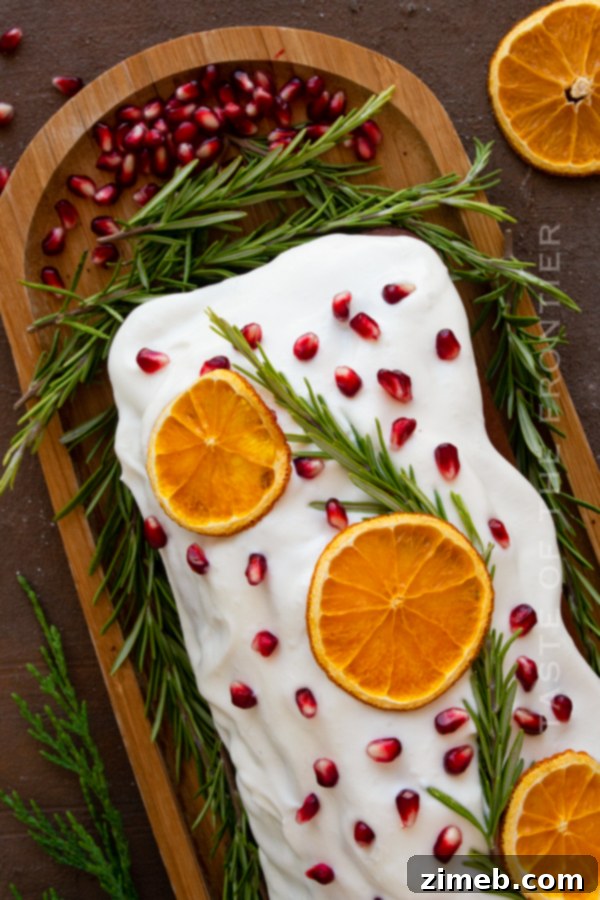 Spiced Ginger Delight 15 A festive holiday loaf cake featuring gingerbread, adorned with icing and decorative elements, perfect for seasonal celebrations.