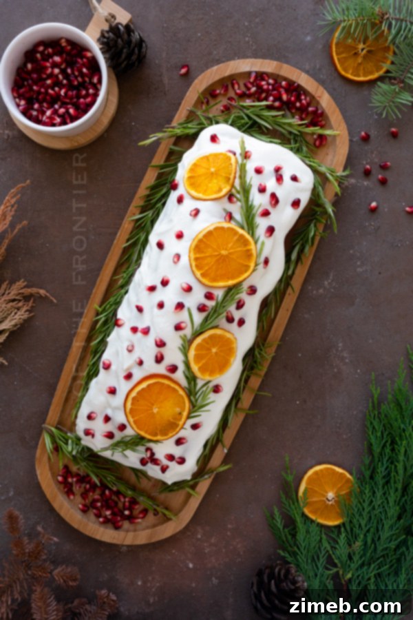 Spiced Ginger Delight 3 A festive holiday loaf cake with a light dusting of confectioner's sugar, ready to be served as a delightful dessert.