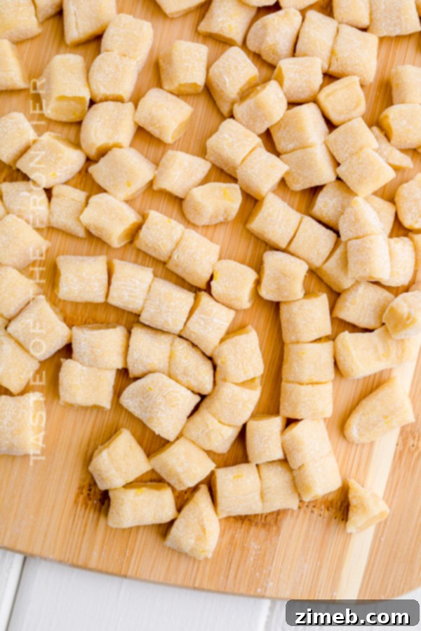 Strips of Struffoli dough cut into small, even pieces
