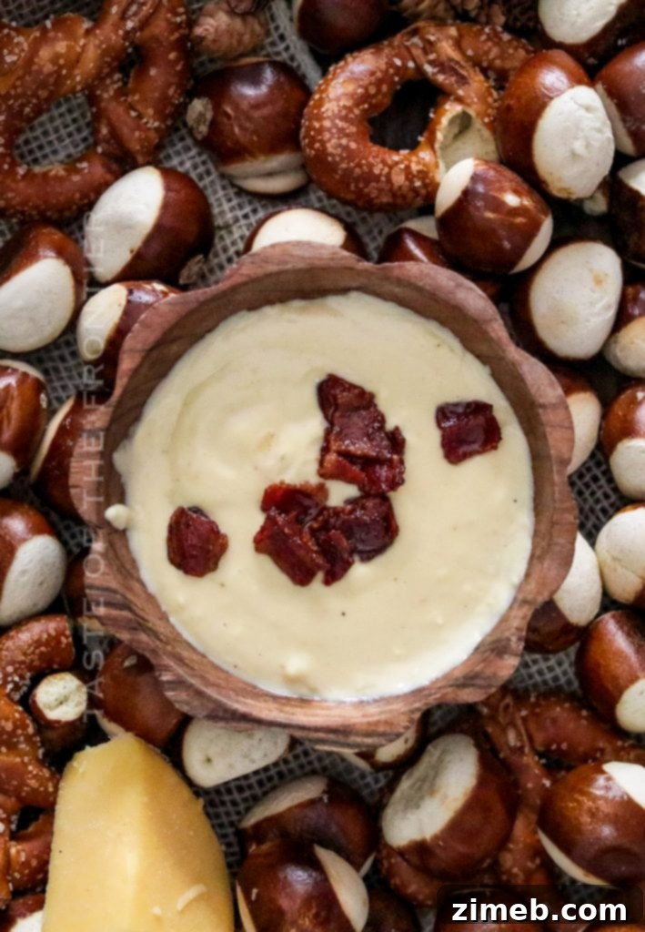 Pretzel Cheese Dip, a creamy warm holiday appetizer perfect for sharing