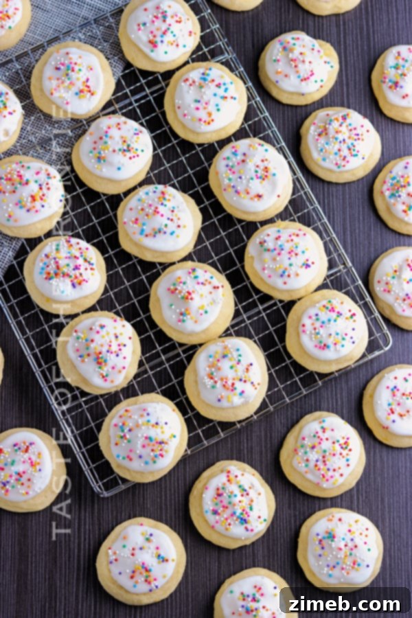 Melt-in-Your-Mouth Ricotta Delights 3 Traditional Italian Ricotta Cookies, freshly baked and ready for glazing, embodying authentic Italian dessert craftsmanship.