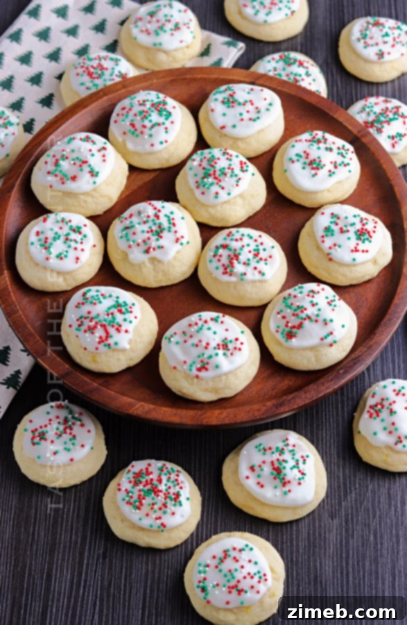 Melt-in-Your-Mouth Ricotta Delights 22 A beautiful display of Italian Christmas Cookies, artfully arranged on a festive platter, ready to be served.