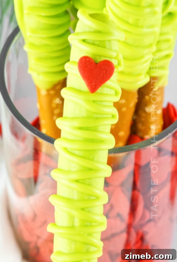 Grinch's Heart-Melting Pretzel Delights 19 Grinch Heart Pretzels for a fun holiday snack
