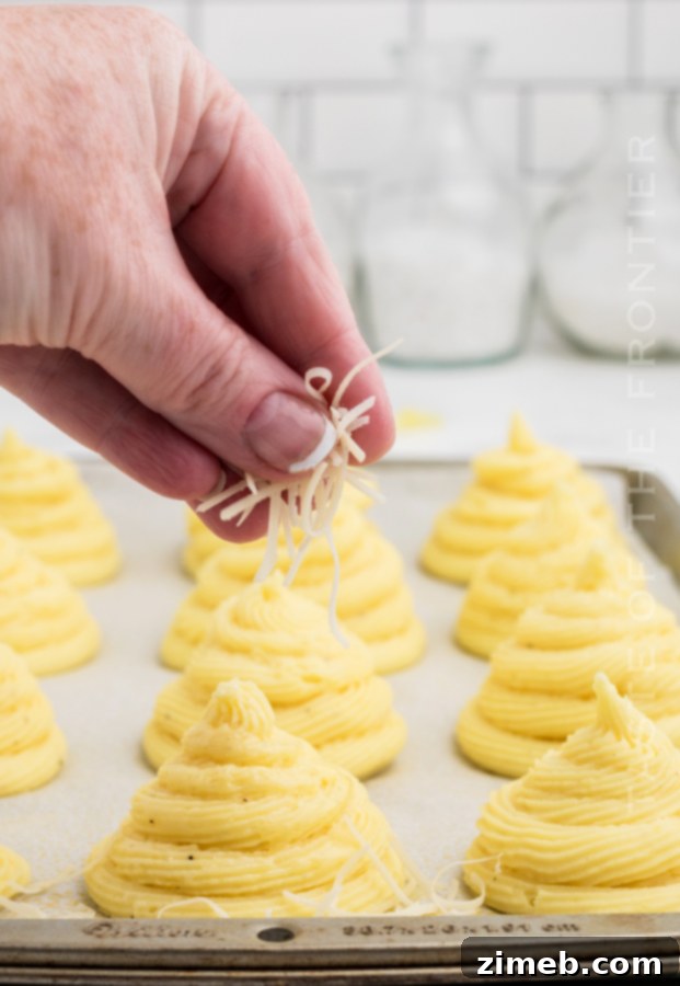 Golden Potato Rosettes 9 adding cheese to potatoes