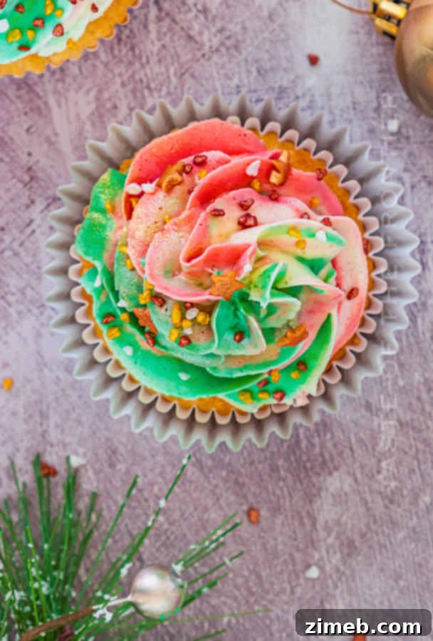 Frosted holiday cupcake with red and green swirl