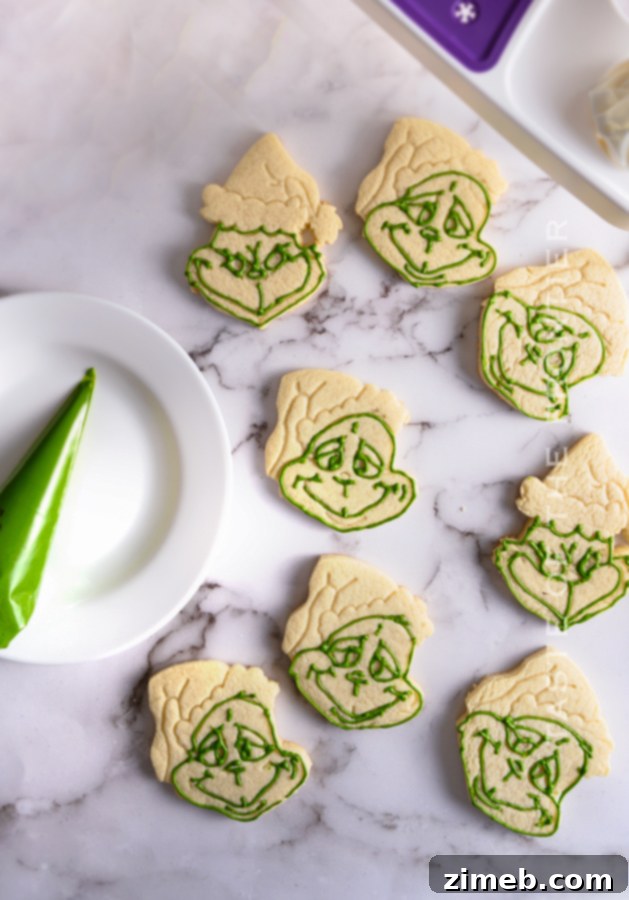 Grinch's Heart-Melting Cookies 8 decorating Grinch Cookies - Applying royal icing